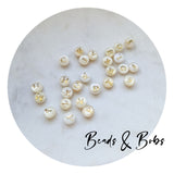 8mm Round Shell Beads With Gold Letter